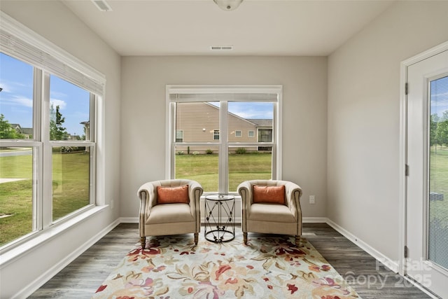 2329 Delaney Dr, Fort Mill, SC 29715 - living area featuring healthy amount of natural light, dark wood-style floors, and baseboards
