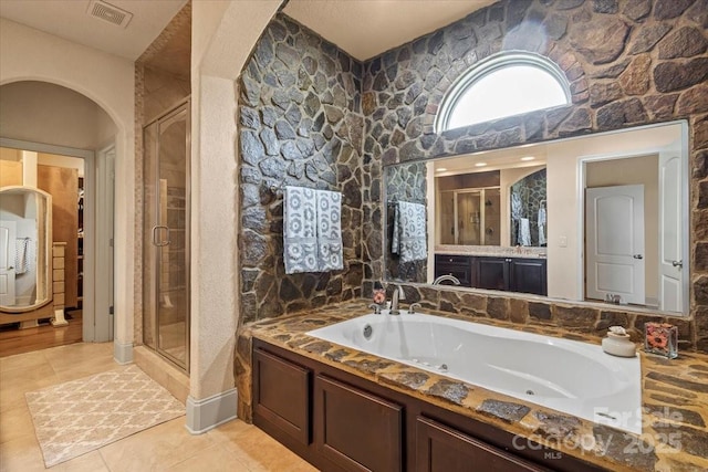 1974 Glen Manor Ct, Lincolnton, NC 28092 - full bathroom featuring a shower stall, a jetted tub, and tile patterned flooring