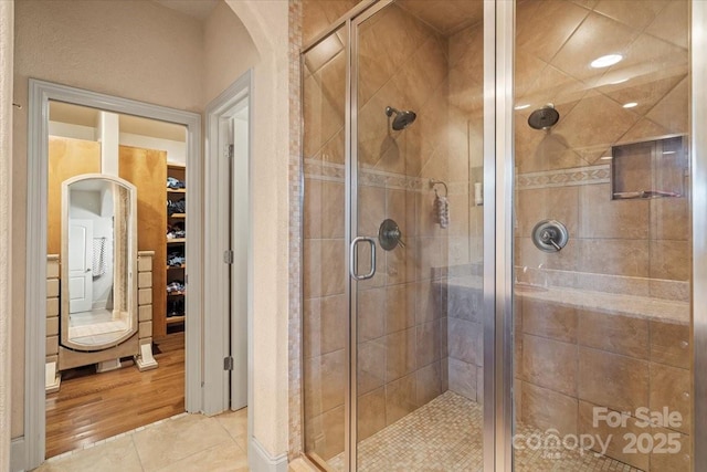 1974 Glen Manor Ct, Lincolnton, NC 28092 - full bath with a shower stall, a walk in closet, and tile patterned flooring