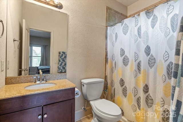 1974 Glen Manor Ct, Lincolnton, NC 28092 - bathroom featuring a textured wall, vanity, toilet, and curtained shower