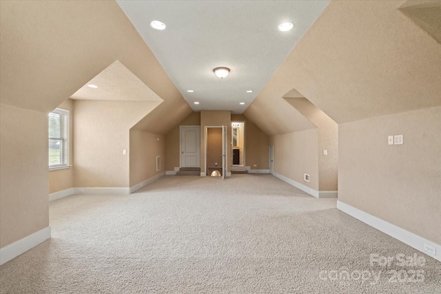 1974 Glen Manor Ct, Lincolnton, NC 28092 - bonus room featuring light colored carpet, lofted ceiling, baseboards, and recessed lighting