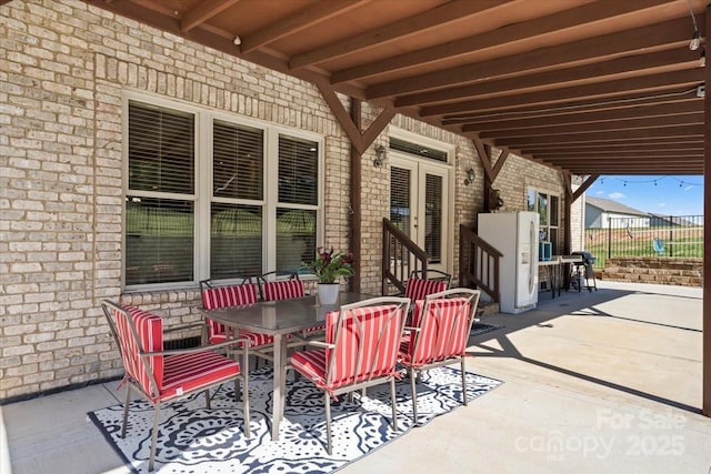 1974 Glen Manor Ct, Lincolnton, NC 28092 - view of patio featuring outdoor dining area and fence