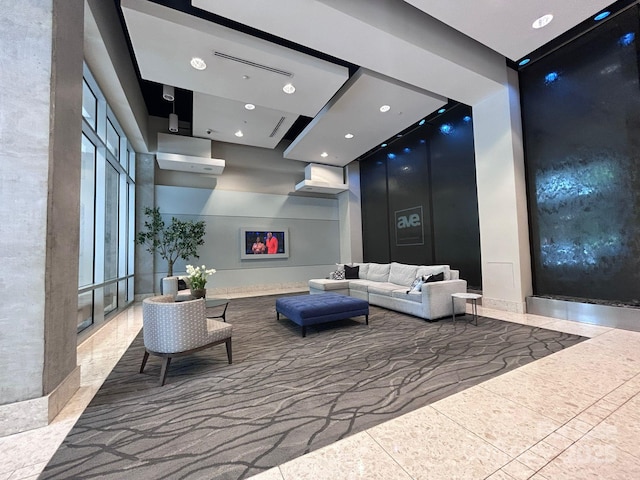 210 N Church St, Charlotte, NC 28202 - common area with a high ceiling and recessed lighting