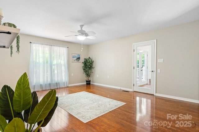 220 Pinehurst Ln, Newton, NC 28658 - sitting room featuring wood finished floors, a ceiling fan, and baseboards
