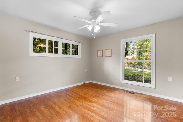 220 Pinehurst Ln, Newton, NC 28658 - spare room with wood finished floors, baseboards, and a ceiling fan