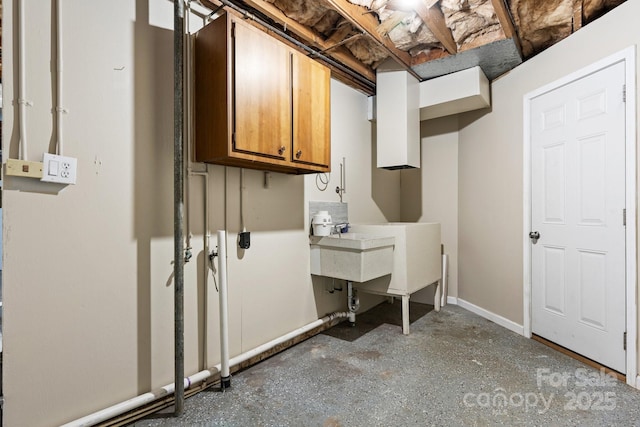 220 Pinehurst Ln, Newton, NC 28658 - washroom featuring cabinet space and baseboards