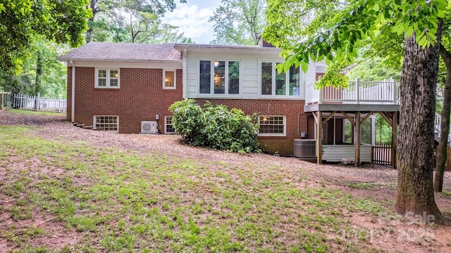 220 Pinehurst Ln, Newton, NC 28658 - back of property featuring brick siding, a deck, and central AC