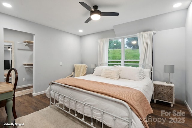 1135 Brook Path Trl, Denver, NC 28037 - bedroom with wood finished floors, recessed lighting, baseboards, a ceiling fan, and a walk in closet