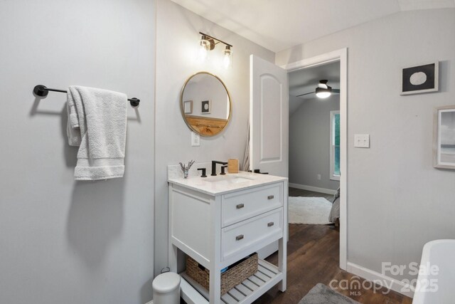 1135 Brook Path Trl, Denver, NC 28037 - bathroom with wood finished floors, baseboards, vanity, and a ceiling fan