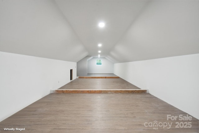1135 Brook Path Trl, Denver, NC 28037 - additional living space with wood finished floors, lofted ceiling, and recessed lighting