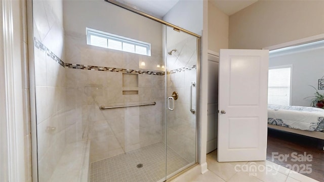 123 Hanks Bluff Dr, Mooresville, NC 28117 - ensuite bathroom with a stall shower and tile patterned flooring