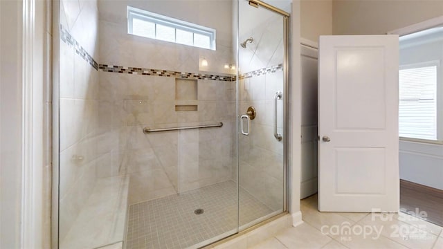 123 Hanks Bluff Dr, Mooresville, NC 28117 - full bath with a shower stall, tile patterned flooring, and healthy amount of natural light