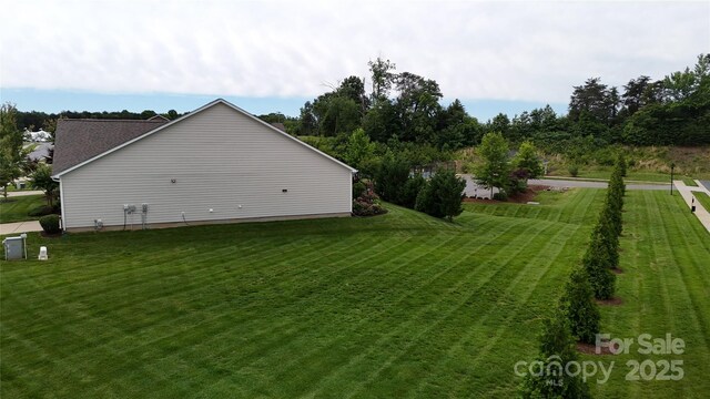 123 Hanks Bluff Dr, Mooresville, NC 28117 - view of side of property featuring a yard