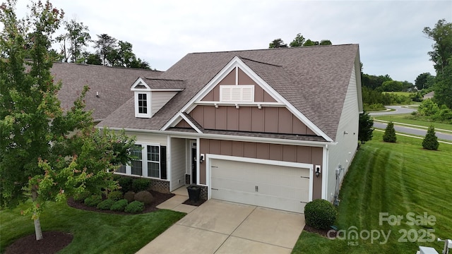 123 Hanks Bluff Dr, Mooresville, NC 28117 - view of front of property featuring board and batten siding, a shingled roof, driveway, and a front yard