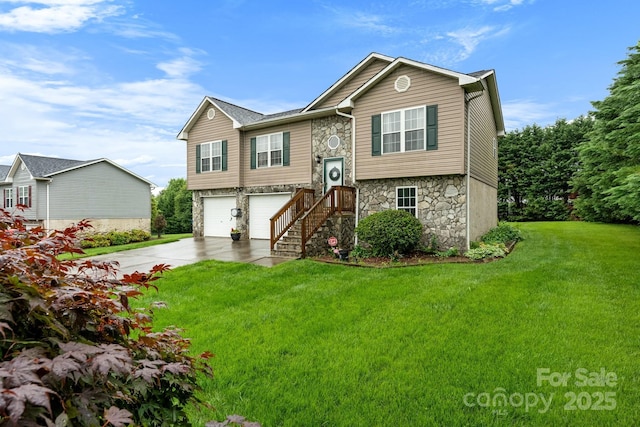 raised ranch featuring stone siding, a garage, driveway, and a front lawn