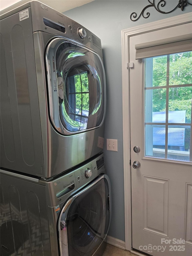 490 Deberry Rd, Mount Gilead, NC 27306 - washroom featuring stacked washer / drying machine and baseboards