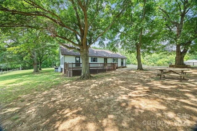 view of yard with a deck