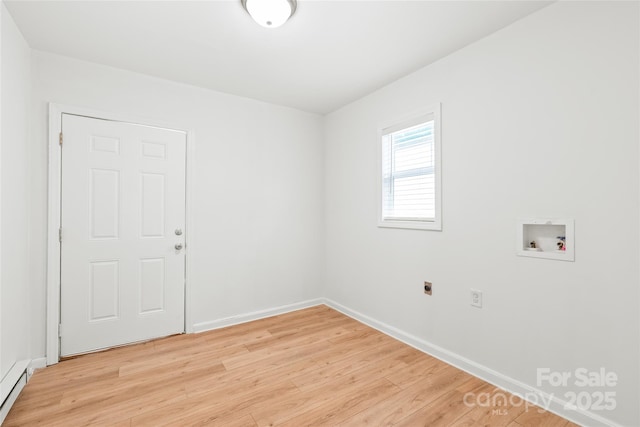 518 Westside Cir, China Grove, NC 28023 - spare room with a baseboard radiator, light wood finished floors, and baseboards