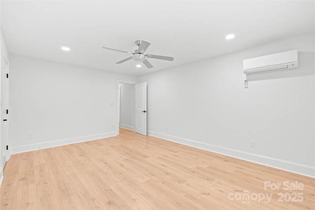 518 Westside Cir, China Grove, NC 28023 - empty room featuring a wall mounted air conditioner, recessed lighting, light wood-style flooring, baseboards, and ceiling fan