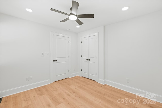 518 Westside Cir, China Grove, NC 28023 - unfurnished bedroom featuring baseboards, light wood-style flooring, recessed lighting, and a ceiling fan