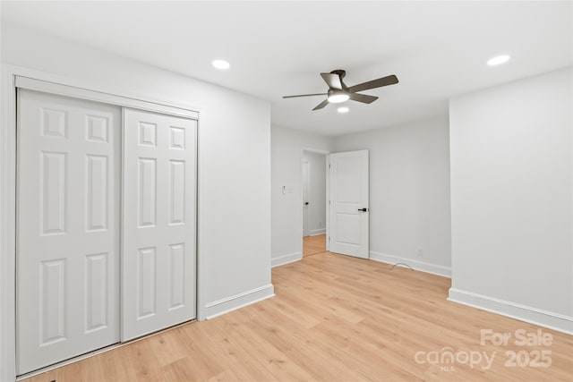 518 Westside Cir, China Grove, NC 28023 - unfurnished bedroom featuring baseboards, recessed lighting, light wood-type flooring, a closet, and a ceiling fan