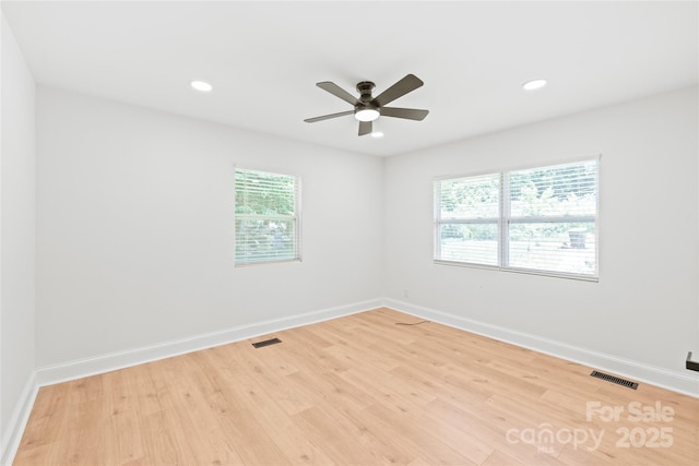 518 Westside Cir, China Grove, NC 28023 - unfurnished room with healthy amount of natural light, a ceiling fan, baseboards, and recessed lighting