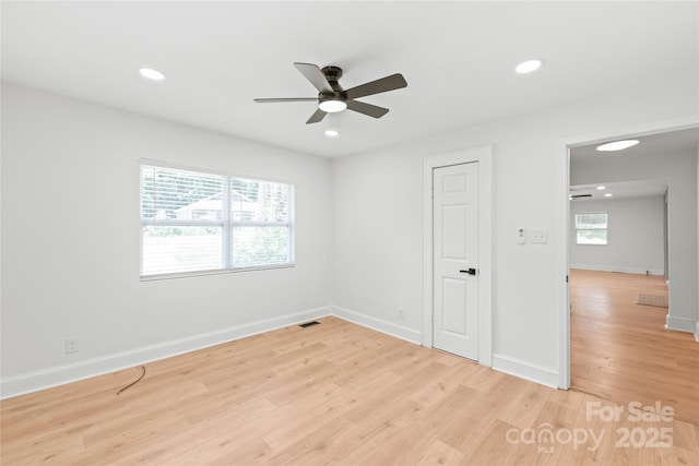 518 Westside Cir, China Grove, NC 28023 - unfurnished bedroom featuring multiple windows, light wood-style flooring, recessed lighting, baseboards, and a ceiling fan