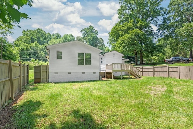 518 Westside Cir, China Grove, NC 28023 - rear view of house with crawl space, stairs, and a wooden deck