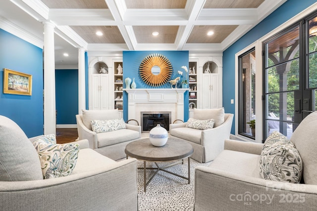5523 Meadow Haven Ln, Charlotte, NC 28270 - living room featuring crown molding, beamed ceiling, recessed lighting, decorative columns, and a glass covered fireplace
