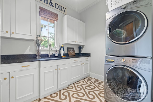 5523 Meadow Haven Ln, Charlotte, NC 28270 - laundry area with stacked washer / drying machine, cabinet space, crown molding, baseboards, and light tile patterned floors
