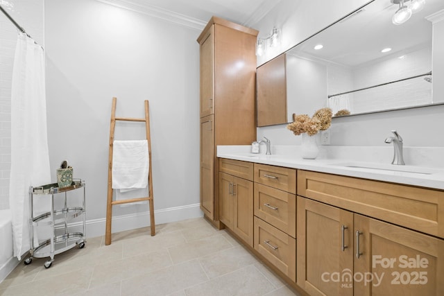 5523 Meadow Haven Ln, Charlotte, NC 28270 - bathroom with crown molding, double vanity, baseboards, recessed lighting, and tile patterned flooring