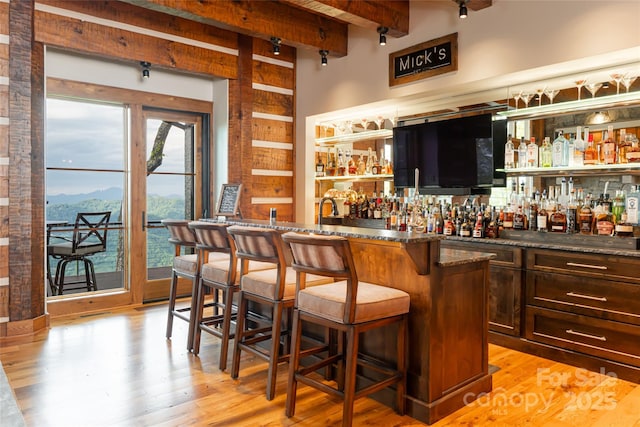 511 Asgi Trl, Maggie Valley, NC 28751 - indoor wet bar with beamed ceiling and light wood finished floors
