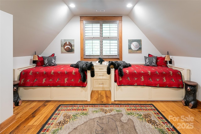 511 Asgi Trl, Maggie Valley, NC 28751 - bedroom featuring wood finished floors and vaulted ceiling