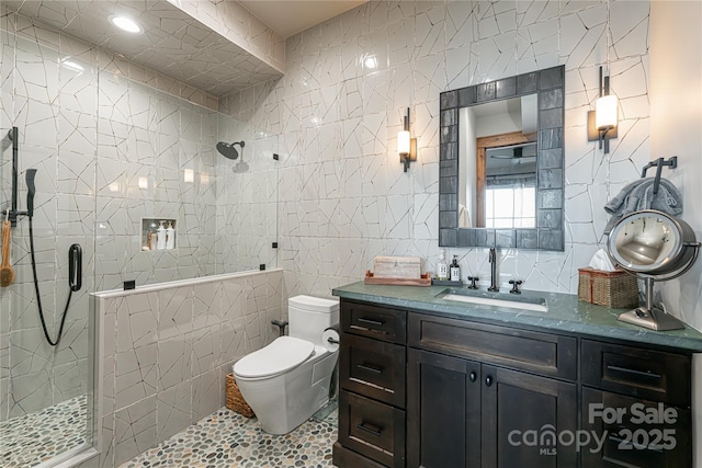 511 Asgi Trl, Maggie Valley, NC 28751 - full bath with tile walls, a stall shower, vanity, and toilet