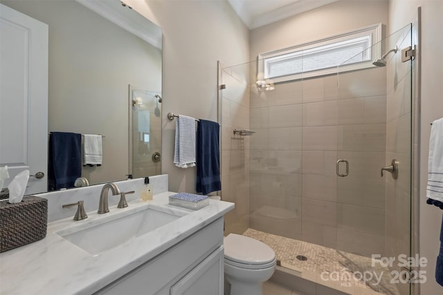 2630 Mary Butler Way, Charlotte, NC 28226 - bathroom featuring a stall shower, crown molding, toilet, and vanity
