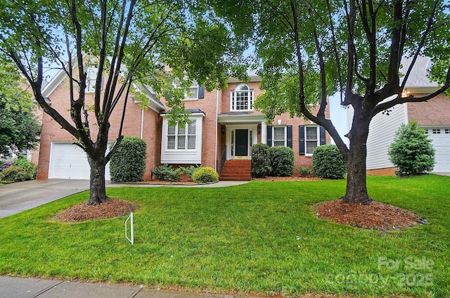 138 Montibello Dr, Mooresville, NC 28117 - view of front of house with driveway, brick siding, and a front lawn