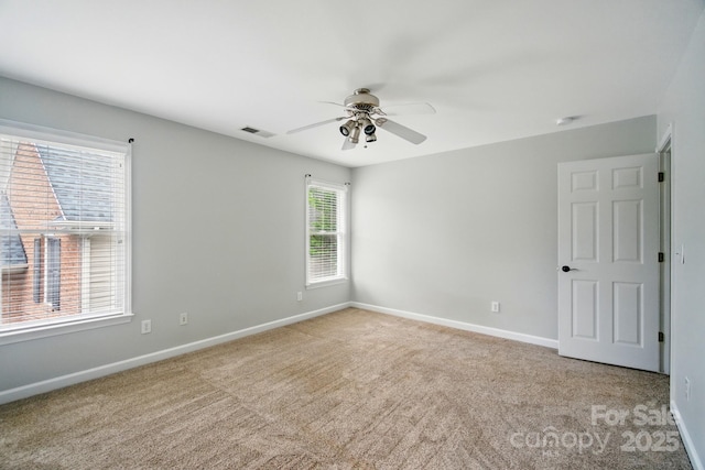 138 Montibello Dr, Mooresville, NC 28117 - spare room with ceiling fan, carpet, and baseboards