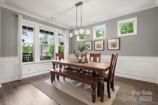 9530 Hightower Oak St, Huntersville, NC 28078 - dining space with ornamental molding, dark wood-style floors, a decorative wall, a wainscoted wall, and a chandelier