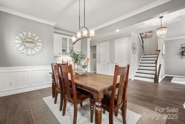 9530 Hightower Oak St, Huntersville, NC 28078 - dining area featuring wood finished floors, stairs, crown molding, a chandelier, and recessed lighting