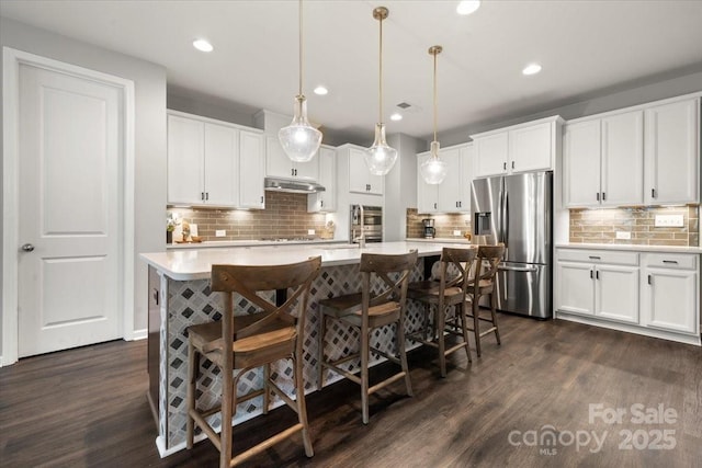 9530 Hightower Oak St, Huntersville, NC 28078 - kitchen featuring stainless steel fridge with ice dispenser, dark wood-type flooring, tasteful backsplash, light countertops, and recessed lighting