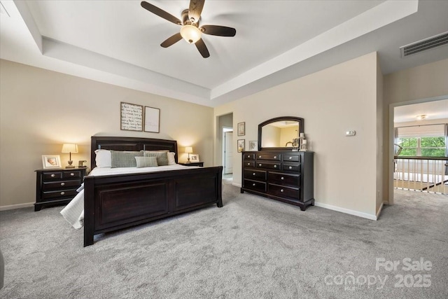 9530 Hightower Oak St, Huntersville, NC 28078 - carpeted bedroom with a raised ceiling, baseboards, and ceiling fan