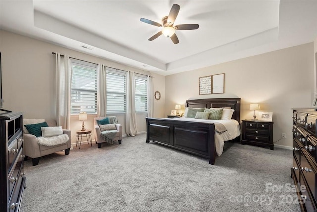 9530 Hightower Oak St, Huntersville, NC 28078 - bedroom featuring a raised ceiling, carpet, a ceiling fan, and baseboards