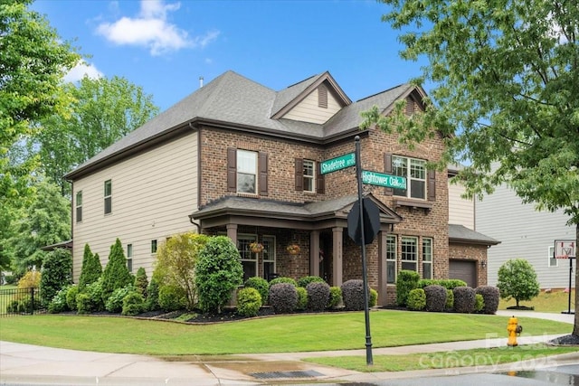 9530 Hightower Oak St, Huntersville, NC 28078 - view of front facade featuring brick siding, a garage, and a front yard