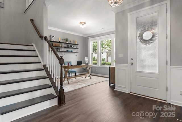 9530 Hightower Oak St, Huntersville, NC 28078 - entrance foyer with ornamental molding, dark wood finished floors, stairway, wainscoting, and a decorative wall