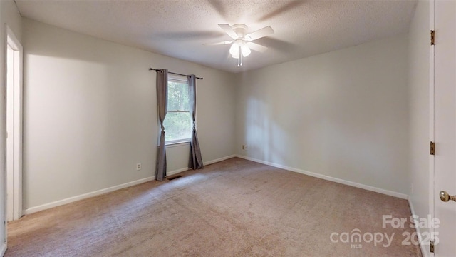2026 Willow Ridge St, Conover, NC 28613 - unfurnished room with carpet, ceiling fan, a textured ceiling, and baseboards
