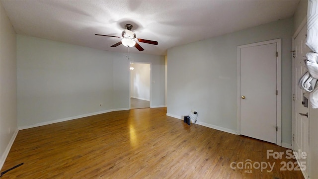 2026 Willow Ridge St, Conover, NC 28613 - spare room featuring ceiling fan, wood finished floors, and baseboards