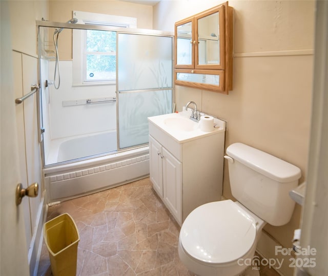 1463 Land St, Lenoir, NC 28645 - full bath with combined bath / shower with glass door, vanity, and toilet