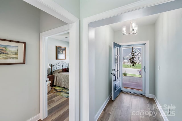 122A Deer Brook Dr Unit A, Shelby, NC 28150 - foyer featuring a chandelier, wood finished floors, and baseboards