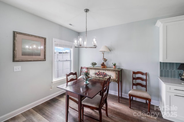 122A Deer Brook Dr Unit A, Shelby, NC 28150 - dining area with a chandelier, dark wood-style floors, and baseboards