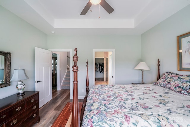 122A Deer Brook Dr Unit A, Shelby, NC 28150 - bedroom with a raised ceiling, a walk in closet, wood finished floors, and ceiling fan